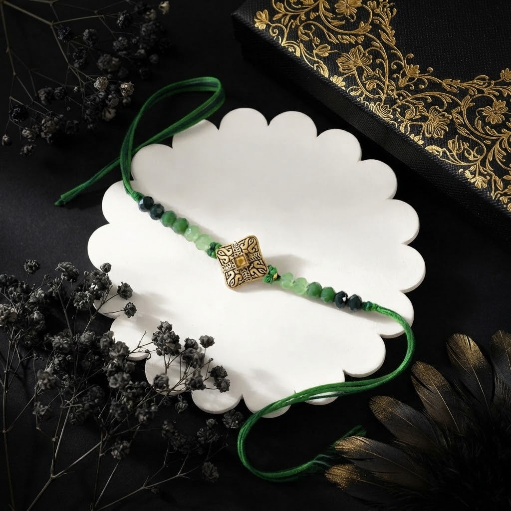 Blessed Golden Mantra Rakhi with Dry Fruits