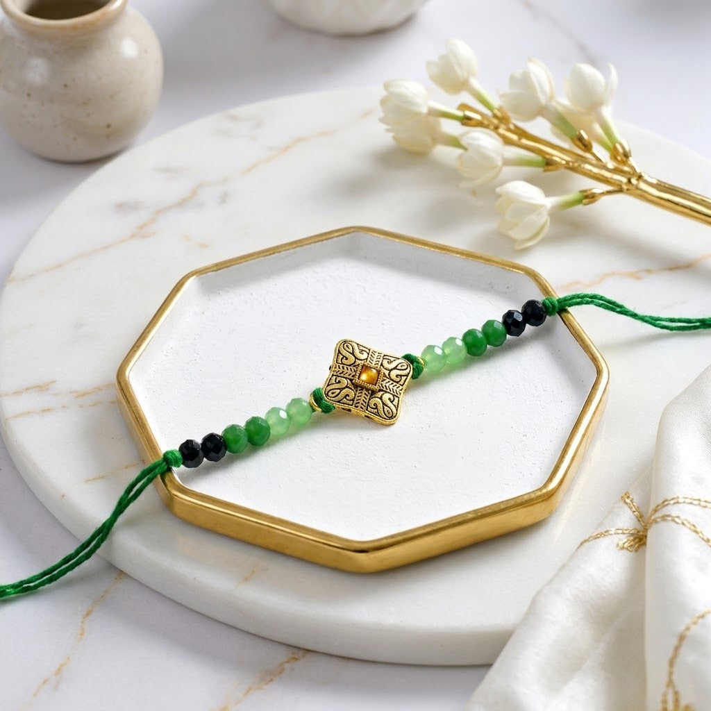 Blessed Golden Mantra Rakhi with cashews