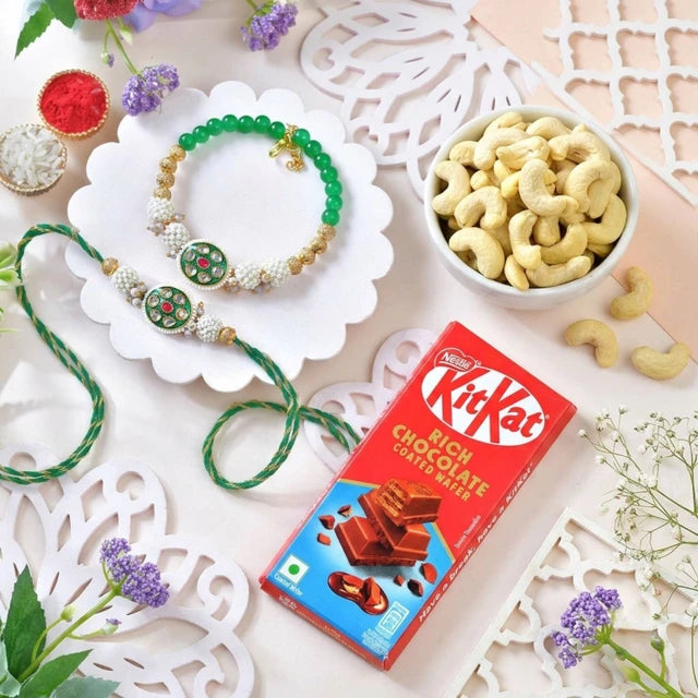 Elegant Golden Green Bhaiya Bhabhi Rakhi With KitKat & Cashew Nuts