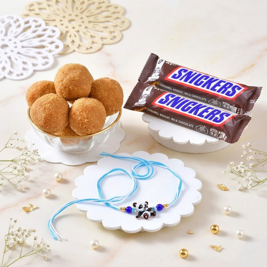 Adorable Panda Rakhi Gift Set with Snicker Chocolate & Besan Laddoo