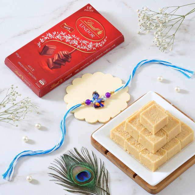 Charming Little Krishna Rakhi for Kids With Lindt Chocolate & Almond Barfi