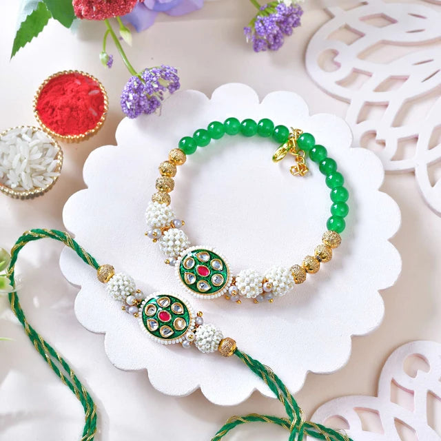 Elegant Golden Green Bhaiya Bhabhi Rakhi With KitKat & Cashew Nuts