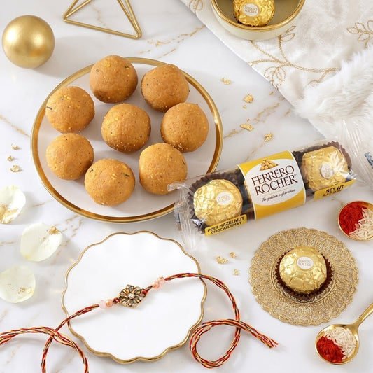 Timeless Golden Flower Rakhi with Besan Laddu & Ferrero Rocher