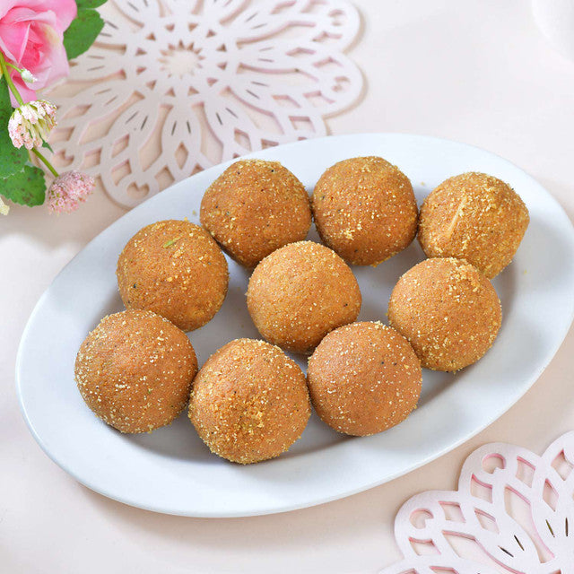 Designer 4-Piece Rakhi Collection with Traditional Besan Laddu