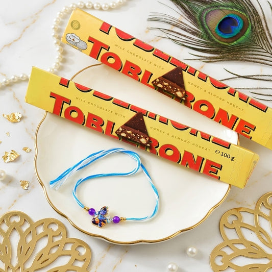 Charming Little Krishna Rakhi for Kids With Toblerone Chocolates