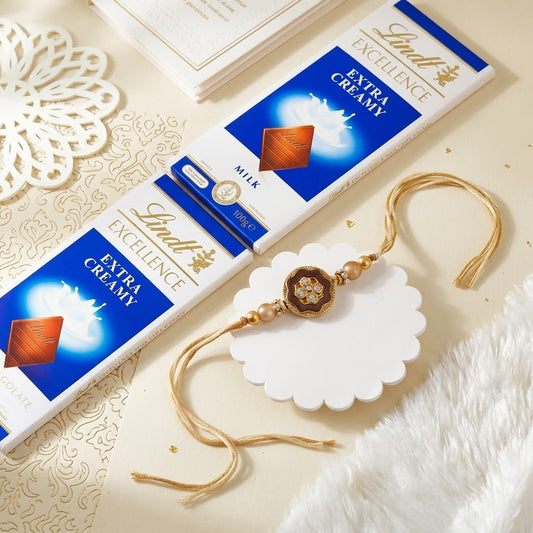 Blushing Rose Gold Flower Rakhi with Lindt Chocolates